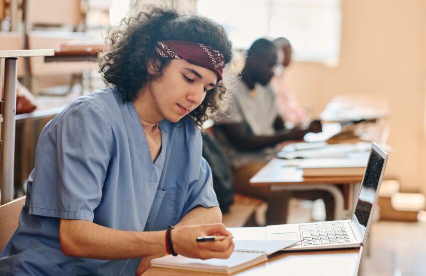 Medical student passing exam at university