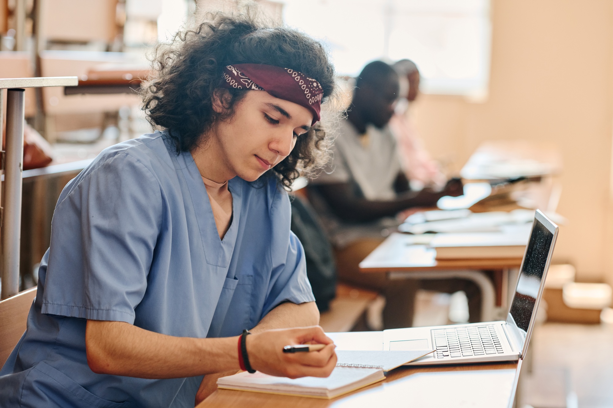 Medical student passing exam at university